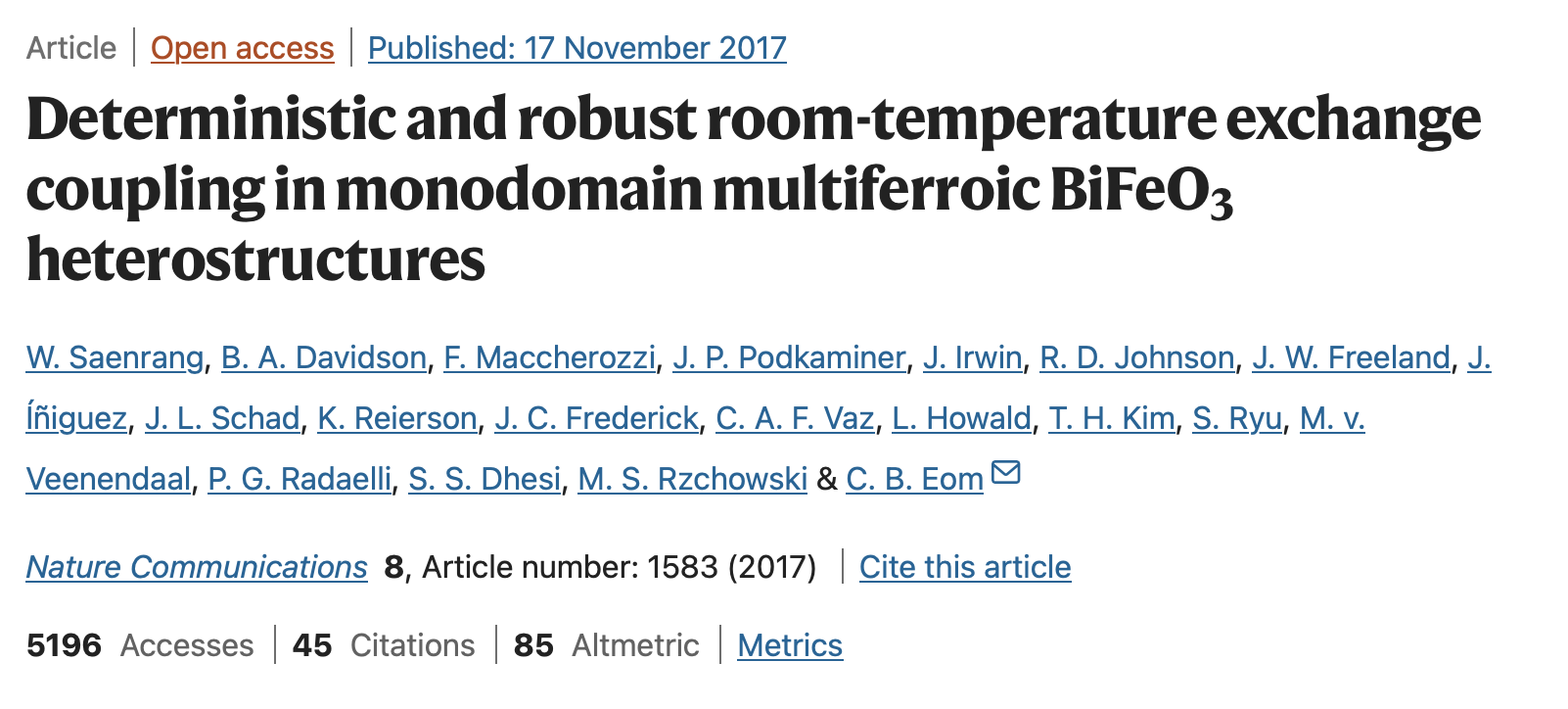 Deterministic and robust room-temperature exchange coupling in monodomain multiferroic BiFeO_3heterostructures